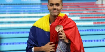 July 31, 2024, Paris, Ile-De-France, France: DAVID POPOVICI of Romania reacts to winning the Swimming Men's 100m Freestyle bronze medal at the Paris 2024 Olympic Games at Paris La Defense Arena in Paris, France,Image: 894734905, License: Rights-managed, Restrictions: , Model Release: no