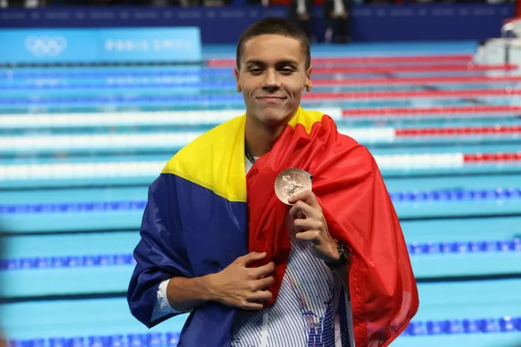 July 31, 2024, Paris, Ile-De-France, France: DAVID POPOVICI of Romania reacts to winning the Swimming Men's 100m Freestyle bronze medal at the Paris 2024 Olympic Games at Paris La Defense Arena in Paris, France,Image: 894734905, License: Rights-managed, Restrictions: , Model Release: no